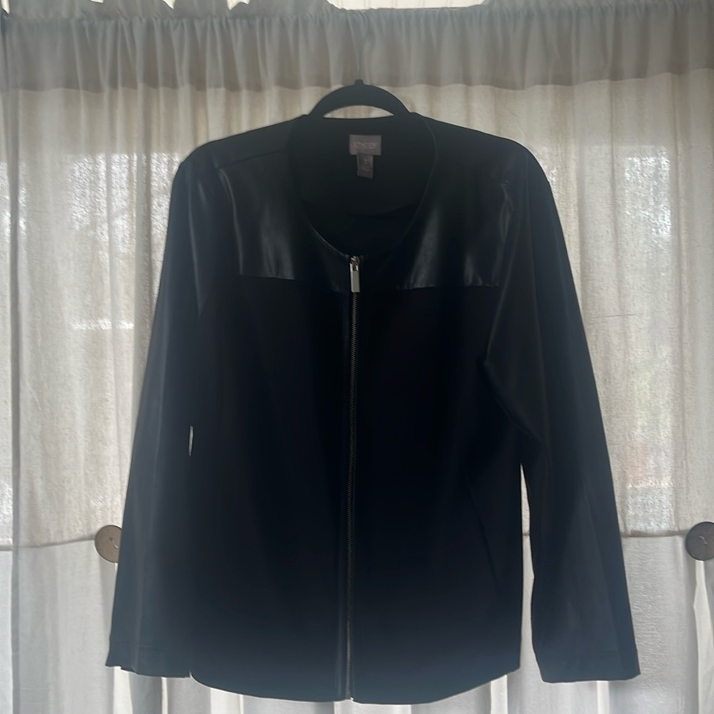 Beautiful black vegan leather and fabric construction. Great Stretch!